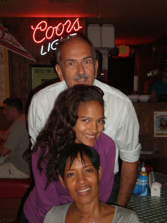 Joline with her family at a restaurant