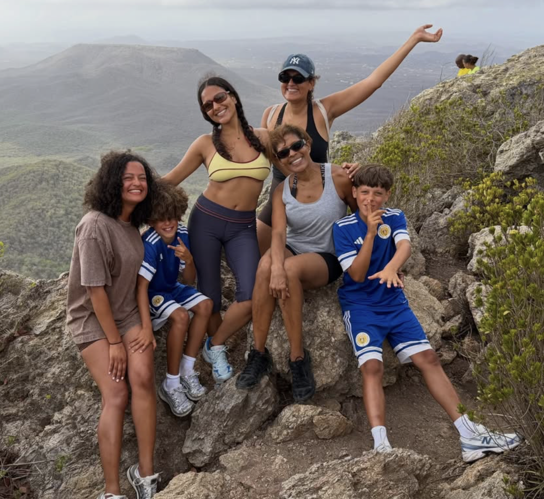 Joline and family on a mountain top